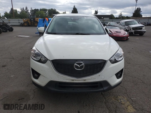 2014 Mazda CX-5 Grand Touring with VIN JM3KE4DY2E0354795, listed as a Copart auction lot 70713544 with 58,848 mi miles and Salvage Title. Bid and sale history available at DreamBid. Image 5.