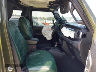 2023 Jeep Wrangler Willys with VIN 1C4HJXDG7PW646627, listed as a IAAI auction lot 42469601 with 50,178 mi miles and . Bid and sale history available at DreamBid. Image 5.