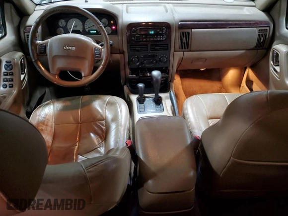 2002 Jeep Grand Cherokee Limited with VIN 1J4GW58NX2C248892, listed as a Copart auction lot 55574615 with 164,010 mi miles and Salvage title. Bid and sale history available at DreamBid. Image 8.