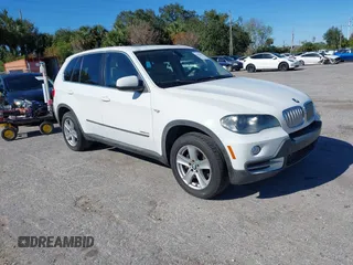 2010 BMW X5 z VIN 5UXFE8C55AL310550, wystawiony jako IAAI lot #41858119 z przebiegiem 85 165 mil mil oraz . Historia ofert i sprzedaży dostępna na DreamBid. Obrazek 1.