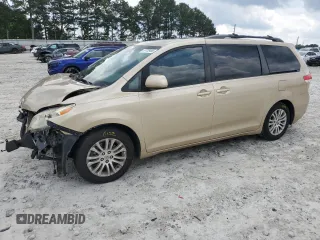 2011 Toyota Sienna XLE AAS с VIN 5TDYK3DC8BS106182, выставлен на аукционе Copart как лот 57728465 с пробегом 168 468 миль миль и Списание • Salvage title. История ставок и продаж доступна на DreamBid. Изображение 1.