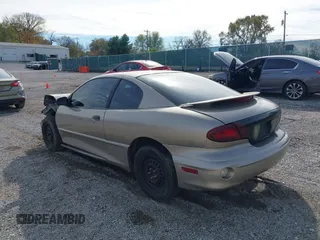 2001 Pontiac Sunfire SE z VIN 1G2JB124017254356, wystawiony jako IAAI lot #42070007 z przebiegiem Nie podano mil oraz . Historia ofert i sprzedaży dostępna na DreamBid. Obrazek 3.