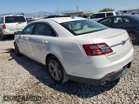 2015 Ford Taurus SEL z VIN 1FAHP2E8XFG181929, wystawiony jako Copart lot #64022325 z przebiegiem 106 272 mil mil oraz Szkoda całkowita • Salvage title. Historia ofert i sprzedaży dostępna na DreamBid. Obrazek 2.