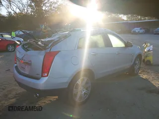 2012 Cadillac SRX Premium Collection with VIN 3GYFNFE36CS509048, listed as a IAAI auction lot 40636427 with 104,001 mi miles. Bid and sale history available at carsss.com. Image 4.