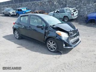 2012 Toyota Yaris L with VIN JTDKTUD35CD529596, listed as a IAAI auction lot 41439354 with 87,493 mi miles. Bid and sale history available at carsss.com. Image 1.
