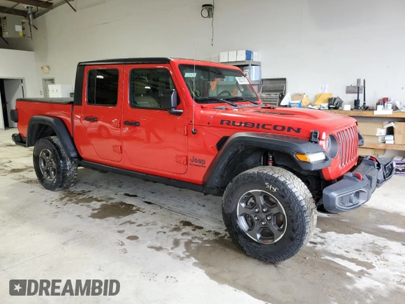 2020 Jeep Gladiator Rubicon with VIN 1C6JJTBG8LL155550, listed as a Copart auction lot 58327875 with 34,276 mi miles and Salvage title. Bid and sale history available at DreamBid. Image 4.