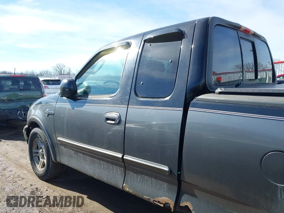 2003 Ford F-150 XL with VIN 1FTRX17W53NB00671, listed as a IAAI auction lot 41576739 with 194,066 mi miles. Bid and sale history available at carsss.com. Image 14.