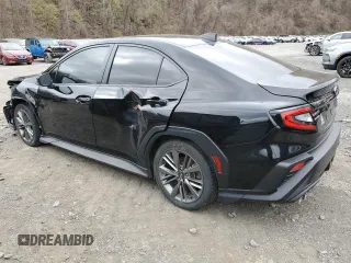 2023 Subaru WRX z VIN JF1VBAA65P9823639, wystawiony jako Copart lot #53605205 z przebiegiem 21 990 mil mil oraz Szkoda całkowita • Salvage title. Historia ofert i sprzedaży dostępna na DreamBid. Obrazek 2.