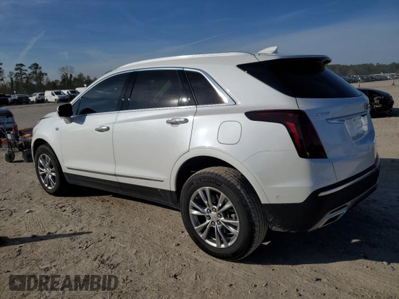 2023 Cadillac XT5 FWD Premium Luxury with VIN 1GYKNCRS7PZ150378, listed as a Copart auction lot 84757014 with 21,631 mi miles and Salvage Title. Bid and sale history available at carsss.com. Image 2.
