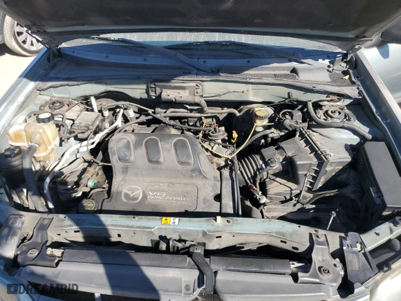 2004 Mazda Tribute ES with VIN 4F2CZ06114KM02980, listed as a Copart auction lot 77319964 with 178,922 mi miles and Salvage Title. Bid and sale history available at carsss.com. Image 12.