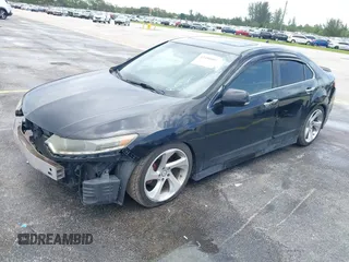 2012 Acura TSX Special Edition with VIN JH4CU2E85CC004753, listed as a IAAI auction lot 42490602 with 165,107 mi miles and . Bid and sale history available at DreamBid. Image 2.