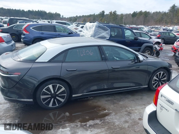 2023 Lucid Air Grand Touring z VIN 50EA1GBA6PA005316, wystawiony jako IAAI lot #41591359 z przebiegiem 4571 mil mil oraz . Historia ofert i sprzedaży dostępna na DreamBid. Obrazek 14.