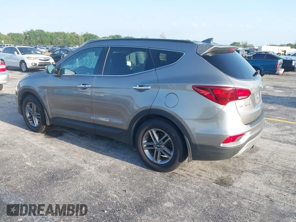 2017 Hyundai Santa Fe 2.4L z VIN 5XYZU3LB0HG420910, wystawiony jako IAAI lot #42017552 z przebiegiem 184 666 mil mil oraz . Historia ofert i sprzedaży dostępna na DreamBid. Obrazek 3.