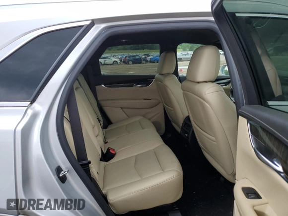 2018 Cadillac XT5 FWD z VIN 1GYKNARS0JZ110512, wystawiony jako Copart lot #64165275 z przebiegiem 98 504 mil mil oraz Czysty tytuł • Clean title. Historia ofert i sprzedaży dostępna na DreamBid. Obrazek 11.