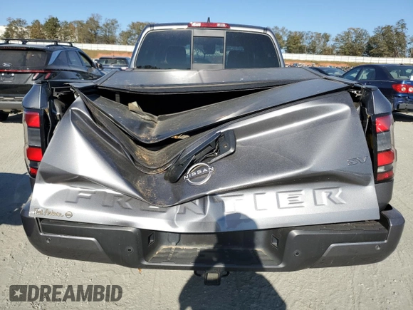 2022 Nissan Frontier SV с VIN 1N6ED1FJ4NN631759, выставлен на аукционе Copart как лот 77612174 с пробегом 29 828 миль миль и Списание • Salvage title. История ставок и продаж доступна на DreamBid. Изображение 6.