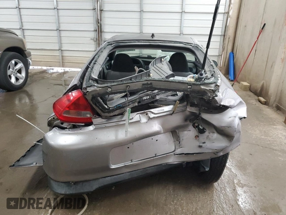 2000 Honda Insight with VIN JHMZE1376YT000164, listed as a Copart auction lot 53851695 with 72,940 mi miles and Salvage title. Bid and sale history available at DreamBid. Image 6.