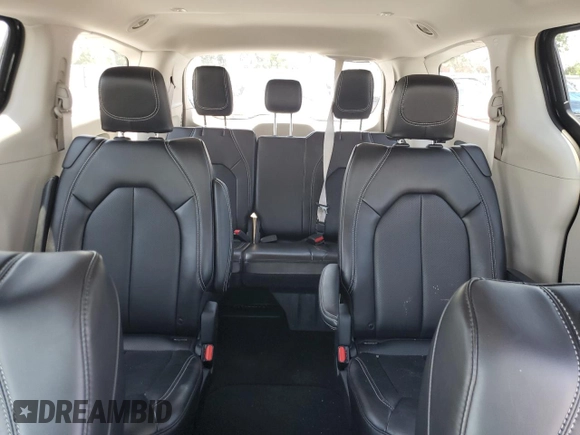 2023 Chrysler Pacifica Touring L с VIN 2C4RC1BG0PR606557, выставлен на аукционе Copart как лот 57833105 с пробегом 18 551 миль миль и Списание • Salvage title. История ставок и продаж доступна на DreamBid. Изображение 10.