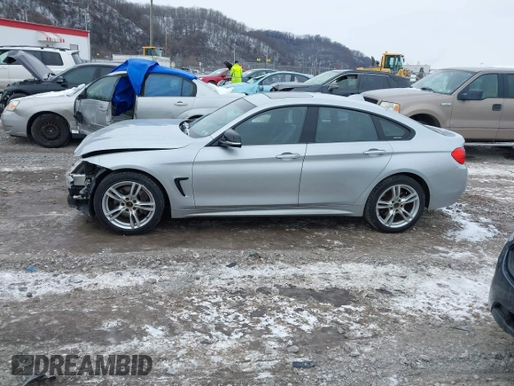 2016 BMW 4 Series 428i xDrive with VIN WBA4C9C53GG136870, listed as a IAAI auction lot 41410071 with 116,187 mi miles and . Bid and sale history available at DreamBid. Image 14.