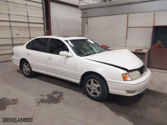 1999 Toyota Avalon XL with VIN 4T1BF18B2XU293904, listed as a IAAI auction lot 41645137 with NaN miles. Bid and sale history available at carsss.com. Image 1.