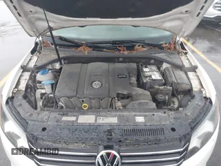 2014 Volkswagen Passat S z VIN 1VWAP7A39EC024253, wystawiony jako IAAI lot #42400664 z przebiegiem 151 628 mil mil oraz . Historia ofert i sprzedaży dostępna na DreamBid. Obrazek 10.
