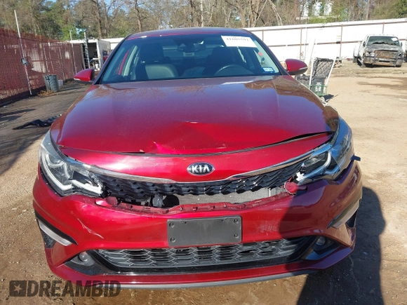 2019 Kia Optima LX z VIN 5XXGT4L3XKG366522, wystawiony jako IAAI lot #41805592 z przebiegiem 65 859 mil mil oraz . Historia ofert i sprzedaży dostępna na DreamBid. Obrazek 13.
