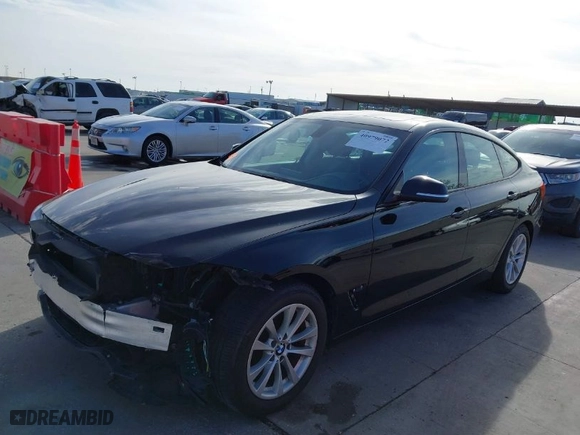 2014 BMW 3 Series Gran Turismo 328i xDrive with VIN WBA3X5C58ED556096, listed as a IAAI auction lot 40979072 with 80,544 mi miles. Bid and sale history available at carsss.com. Image 2.