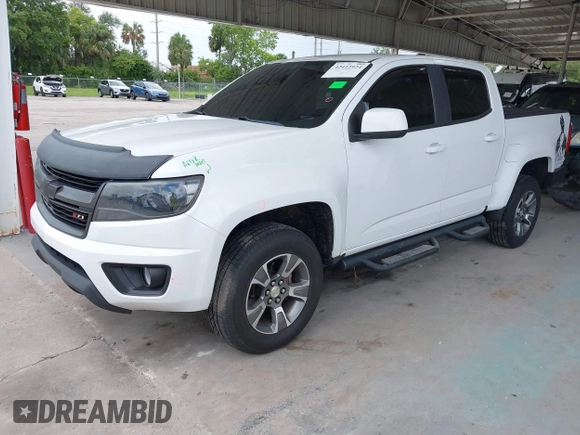 2020 Chevrolet Colorado 2WD Z71 with VIN 1GCGSDEN2L1159458, listed as a IAAI auction lot 42412924 with 90,011 mi miles and . Bid and sale history available at DreamBid. Image 19.
