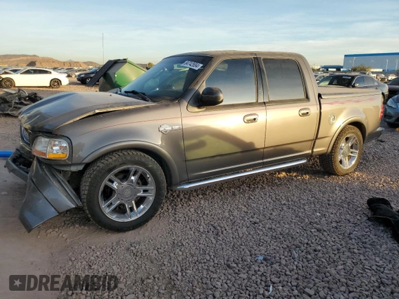 2002 Ford F-150 Harley Davidson with VIN 1FTRW07332KE04049, listed as a Copart auction lot 84742654 with 287,346 mi miles and Salvage Title. Bid and sale history available at carsss.com. Image 1.