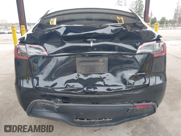 2023 Tesla Model Y Long Range with VIN 7SAYGDEE4PF789102, listed as a IAAI auction lot 41788860 with 88,457 mi miles and . Bid and sale history available at DreamBid. Image 6.