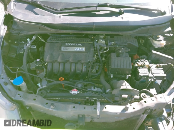 2011 Honda Insight с VIN JHMZE2H36BS003168, выставлен на аукционе IAAI как лот 41863599 с пробегом 110 882 миль миль и . История ставок и продаж доступна на DreamBid. Изображение 10.