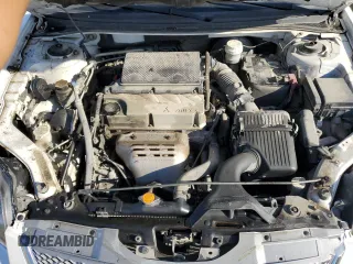 2011 Mitsubishi Galant FE z VIN 4A32B2FF4BE019728, wystawiony jako Copart lot #73040864 z przebiegiem 172 136 mil mil oraz Szkoda całkowita • Salvage title. Historia ofert i sprzedaży dostępna na DreamBid. Obrazek 12.