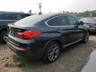 2015 BMW X4 xDrive28i with VIN 5UXXW3C55F0M87998, listed as a Copart auction lot 59693723 with 73,846 mi miles. Bid and sale history available at carsss.com. Image 3.