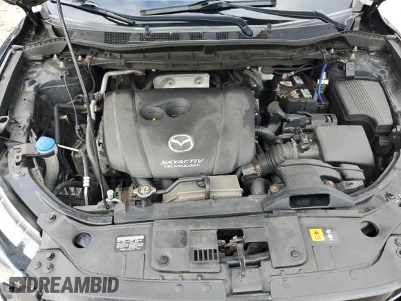 2014 Mazda CX-5 Grand Touring with VIN JM3KE4DY5E0392571, listed as a Copart auction lot 51044335 with 141,334 mi miles and Clean Title. Bid and sale history available at carsss.com. Image 12.