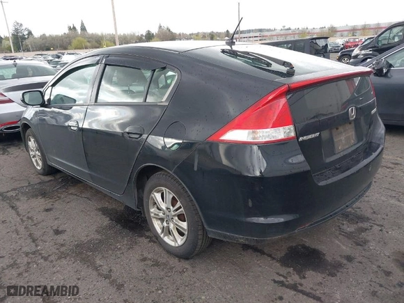 2010 Honda Insight EX with VIN JHMZE2H7XAS040192, listed as a IAAI auction lot 41926116 with 384,045 mi miles. Bid and sale history available at carsss.com. Image 3.