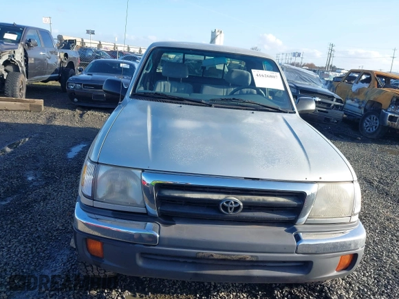 2000 Toyota Tacoma with VIN 5TEWN72N4YZ708230, listed as a IAAI auction lot 41626807 with 216,237 mi miles and . Bid and sale history available at DreamBid. Image 12.