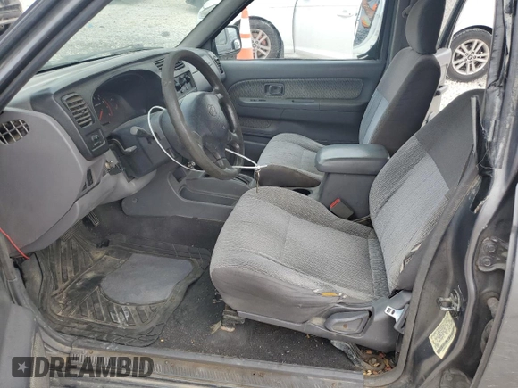2000 Nissan Frontier XE with VIN 1N6ED27T3YC348002, listed as a Copart auction lot 54538235 with 289,922 mi miles and Salvage title. Bid and sale history available at DreamBid. Image 7.