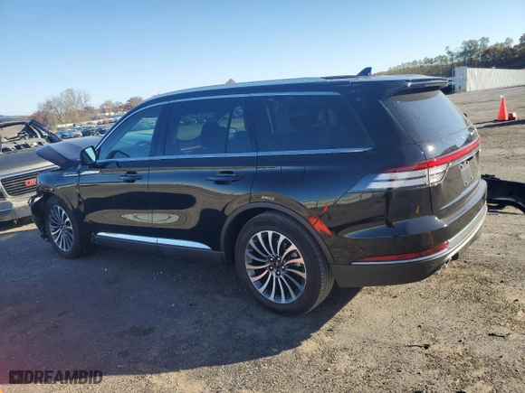 2023 Lincoln Aviator Reserve with VIN 5LM5J7XC5PGL21618, listed as a Copart auction lot 77309844 with 11,989 mi miles and Salvage Title. Bid and sale history available at carsss.com. Image 2.