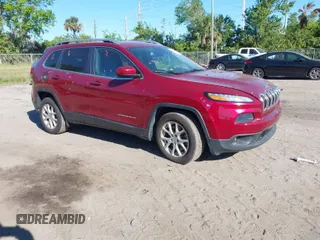 2016 Jeep Cherokee 75th Anniversary with VIN 1C4PJLCB5GW127344, listed as a IAAI auction lot 41843697 with 156,137 mi miles. Bid and sale history available at carsss.com. Image 1.