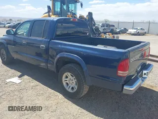 2002 Dodge Dakota SLT with VIN 1B7HL48N32S708719, listed as a IAAI auction lot 42027763 with 217,797 mi miles. Bid and sale history available at carsss.com. Image 3.