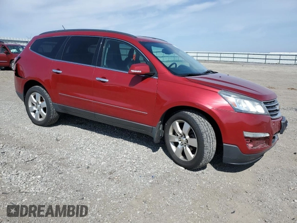 2014 Chevrolet Traverse LTZ z VIN 1GNKVJKD8EJ324323, wystawiony jako Copart lot #51430325 z przebiegiem 141 209 mil mil oraz Szkoda całkowita • Salvage title. Historia ofert i sprzedaży dostępna na DreamBid. Obrazek 4.