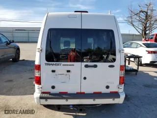 2010 Ford Transit Connect Wagon XLT with VIN NM0KS9BN1AT029858, listed as a Copart auction lot 82120414 with 0 mi miles and Salvage Title. Bid and sale history available at carsss.com. Image 6.