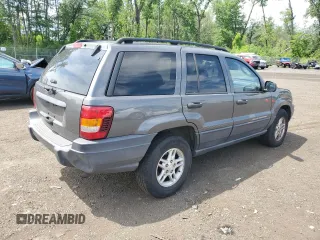 2004 Jeep Grand Cherokee Laredo with VIN 1J4GW48S64C291404, listed as a Copart auction lot 62835335 with 170,365 mi miles and Salvage title. Bid and sale history available at DreamBid. Image 3.