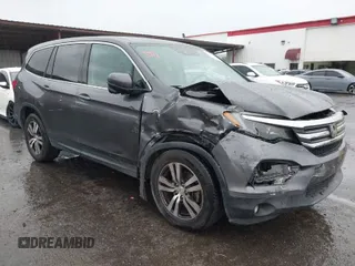 2017 Honda Pilot EX-L z VIN 5FNYF6H69HB039888, wystawiony jako IAAI lot #41494433 z przebiegiem 159 820 mil mil oraz . Historia ofert i sprzedaży dostępna na DreamBid. Obrazek 1.