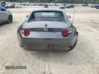 2023 Mazda MX-5 Miata Grand Touring with VIN JM1NDAM7XP0558827, listed as a Copart auction lot 79390864 with 14,901 mi miles and Salvage title. Bid and sale history available at DreamBid. Image 6.
