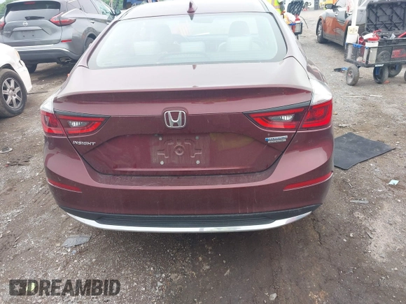 2020 Honda Insight Touring z VIN 19XZE4F93LE010040, wystawiony jako IAAI lot #42240572 z przebiegiem 52 299 mil mil oraz . Historia ofert i sprzedaży dostępna na DreamBid. Obrazek 16.