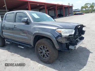 2020 Toyota Tacoma SR5 z VIN 5TFAZ5CN4LX091283, wystawiony jako IAAI lot #42076014 z przebiegiem 61 246 mil mil oraz . Historia ofert i sprzedaży dostępna na DreamBid. Obrazek 6.