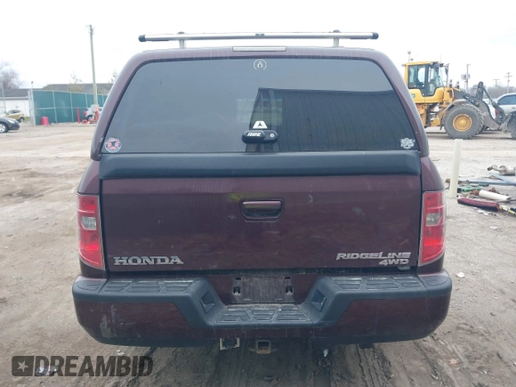 2011 Honda Ridgeline RTL with VIN 5FPYK1F51BB007959, listed as a IAAI auction lot 41894350 with 186,926 mi miles. Bid and sale history available at carsss.com. Image 16.