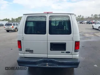 2013 Ford Econoline Cargo Commercial with VIN 1FTNE2EL2DDA97948, listed as a IAAI auction lot 41616701 with 199,739 mi miles and . Bid and sale history available at DreamBid. Image 16.