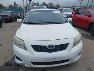 2010 Toyota Corolla with VIN 2T1BU4EE0AC359882, listed as a IAAI auction lot 42051633 with 227,481 mi miles. Bid and sale history available at carsss.com. Image 12.