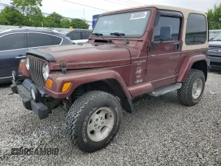 2001 Jeep Wrangler Sahara z VIN 1J4FA59SX1P305100, wystawiony jako Copart lot #58606685 z przebiegiem 76 856 mil mil oraz Czysty tytuł • Clean title. Historia ofert i sprzedaży dostępna na DreamBid. Obrazek 1.